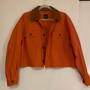 Orange/brown (Cordaroy collar) cropped light weight jacket.